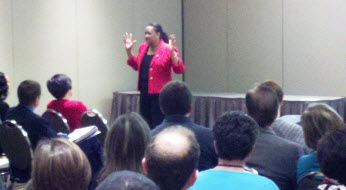 Lindsay Speaking at an Event Lindsay Speaking at an Event